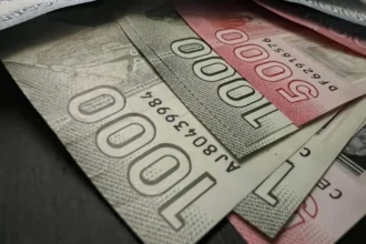 Aprobado reajuste salarial: alza en dos etapas genera críticas presentes