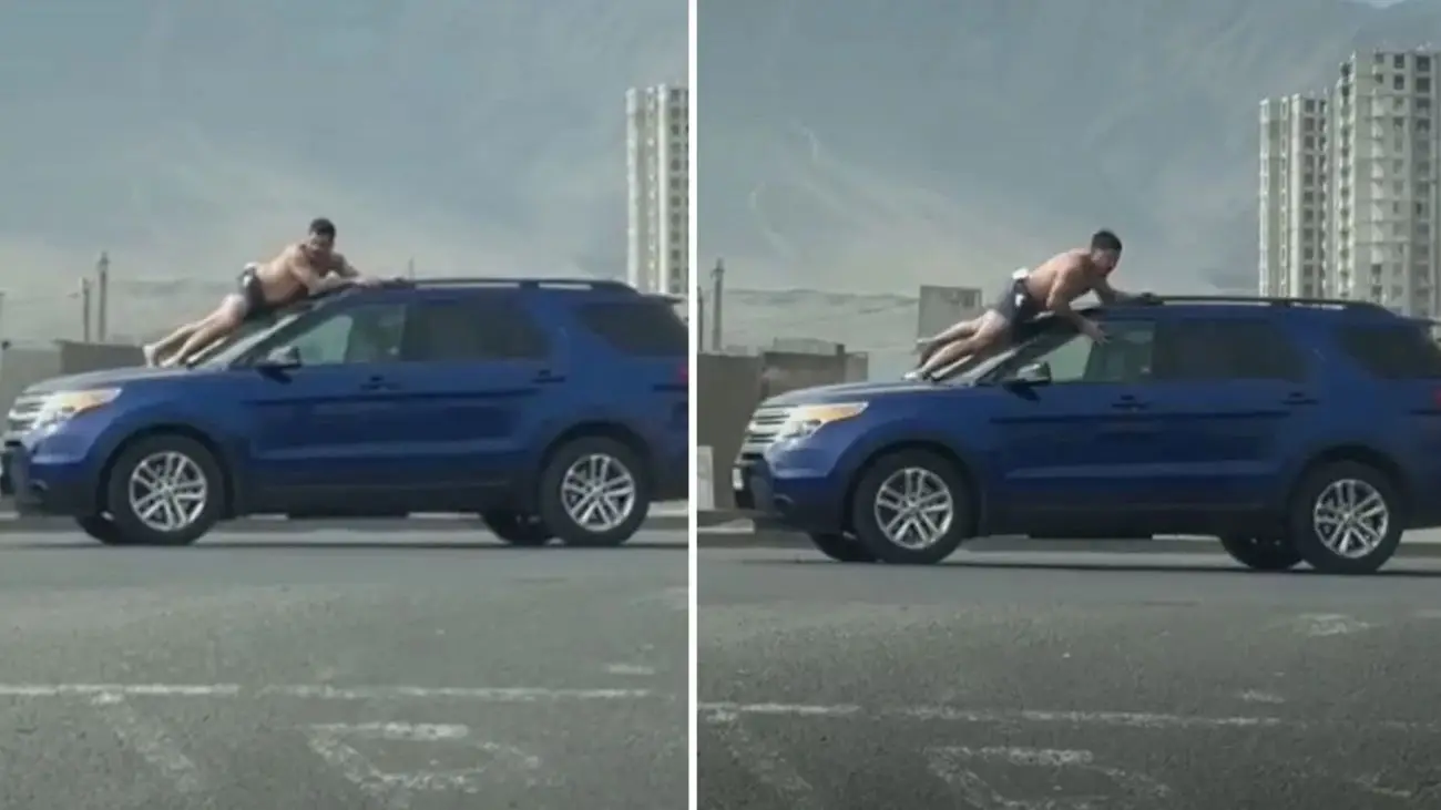 Hombre semidesnudo sobre auto en movimiento termina en detención por VIF